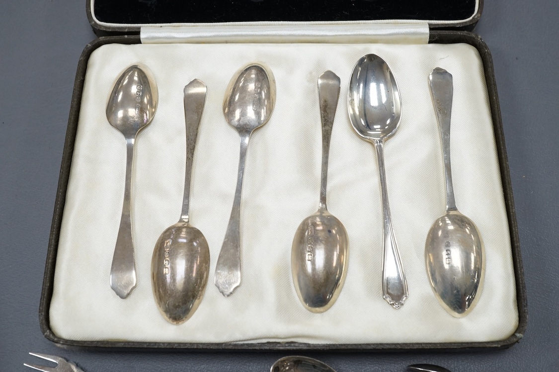 A collection silver to include a modern commemorative Britannia standard dish, cased, a cased set of six George VI teaspoons and other sundry flatware.